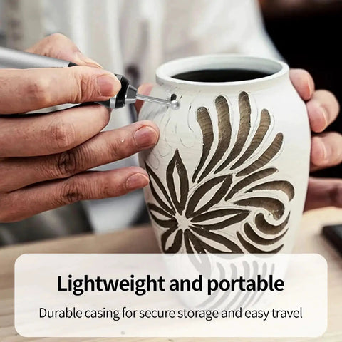 Person using Wireless Engraving Pen Kit With 30 Metal Grinding Bits Ceramic Bit And 3 Cutting Blades on ceramic vase