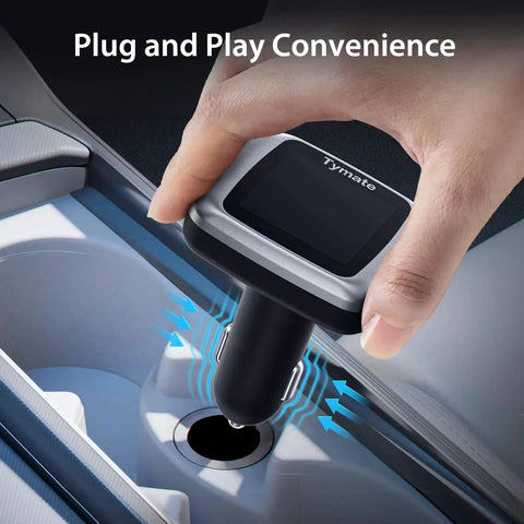 Hand plugging TM7 Wireless Tire Pressure Monitoring System into car charging port