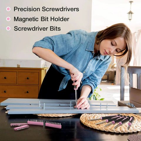 Woman using tools from the Pink 263-Piece Home Repair Tool Kit With Wide Mouth Storage Bag For DIY Projects And Breast Cancer Awareness Ribbon