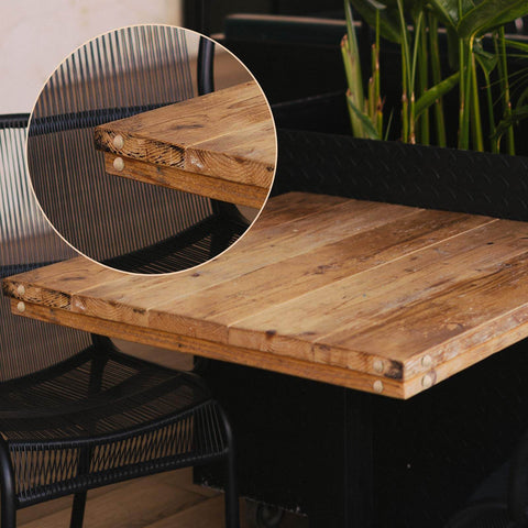 Close-up of 50 Piece Wooden Button Top Screw Hole Plugs For Furniture And Home installed on a wood table, 0.59 x 0.32 x 0.47 inch size.