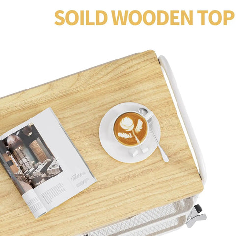 Top view of a 3-Tier Metal Rolling Cart With Wood Top And Drawer, White On Wheels, with a magazine and coffee cup on the wood top.