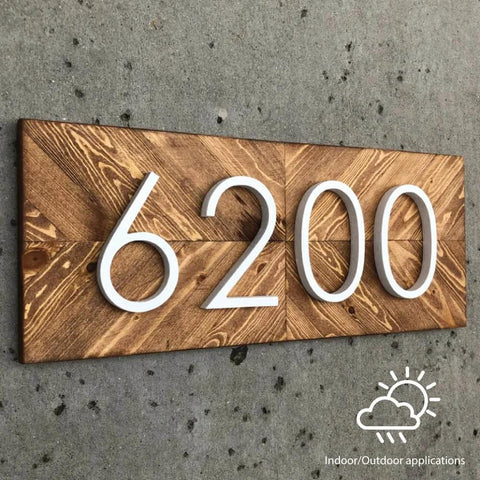 Wooden address plaque with number 6200 and indoor/outdoor applications icon.