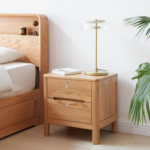 Wooden nightstand with lamp, secured by keyed alike cam locks one and a half inch extra long cabinet locks with two keys.