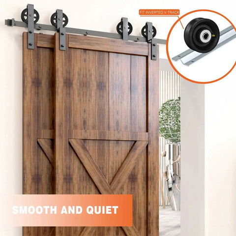 4 Inch By One And A Half Inch Cast Iron V Groove Wheel With Roller Bearing 600 Lbs Capacity Designed For Heavy Duty Roll Tracks And Sliding Gates Industrial Metal Casters For Rolling Applications Durable Black 1 Pack installed on wooden sliding barn door with inset roller bearing image
