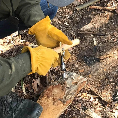 Person using Craft Handle for 6.35mm and 10mm Hex Shafts with Brass Chuck and Rubber Wood Body on log outdoors
