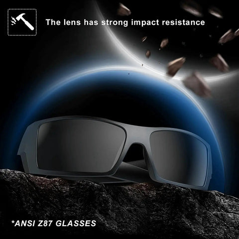 Impact-resistant wraparound rectangular sunglasses for men with UV400 and Z87 rating in matte black, displayed on rock surface.