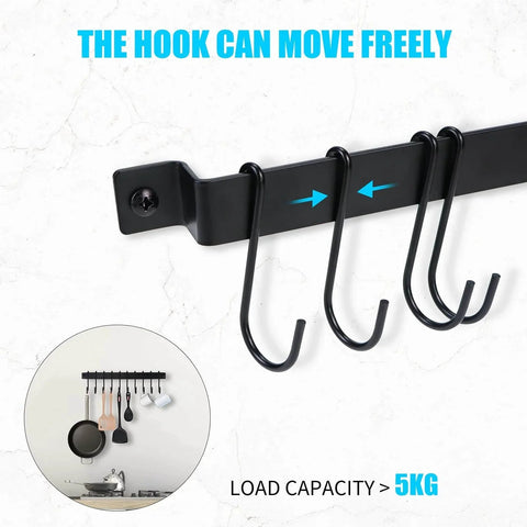 Close-up of black Wrought Iron Kitchen Holder: 10-Hook Wall-Mounted Utensil Rack showing movable hooks and load capacity text.