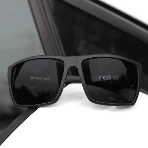 XL Wide Fit Z87 Sunglasses for Large Heads Men Women TR90 Ultralight UV400 Lenses resting on a car window