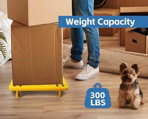 High Visibility Yellow 300-lb Capacity Movers Dolly with 4 Swivel Casters, 19-1/2" x 14-1/2" Platform holding boxes