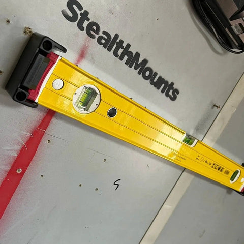 Yellow Universal Level Holder With Locking Mounts For All Levels In A 2 Pack Fits All Brands And Surfaces Ready For Secure Level Storage And Hassle Free Transport StealthMounts Built For Everyday Use No Brainer Setup.