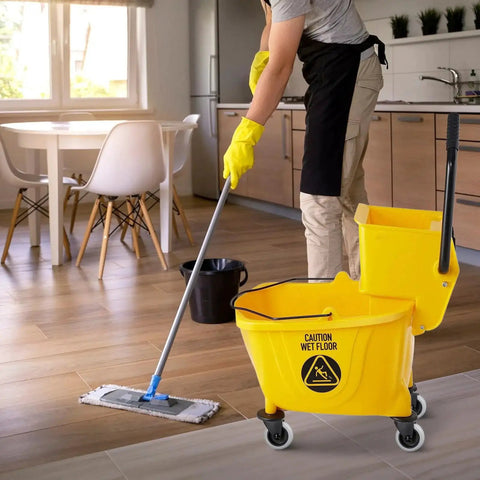 Yellow mop bucket in a kitchen with Four Piece Mop Bucket Wheel Replacement Set Non Marking TPR Casters For Models 7570 L2.