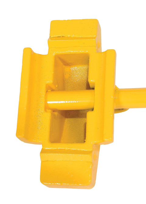 Close-up of Steel Single Rail Chock With Handle For Keeping Railroad Cars From Moving All Welded Steel Construction Bright Yellow Finish