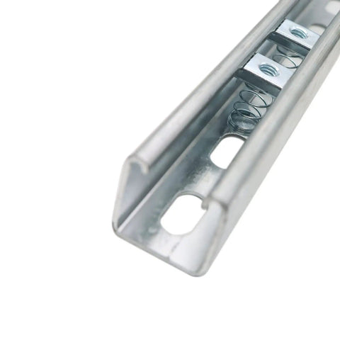 Close-up of durable zinc-plated 3/8-16 strut channel nuts installed on a Unistrut, showing spring mounting for steel framing.